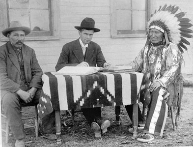 (“U.S. allotting surveyor and his interpreter making an American citizen of Chief American Horse, Oglala Sioux,” c1907) [33]